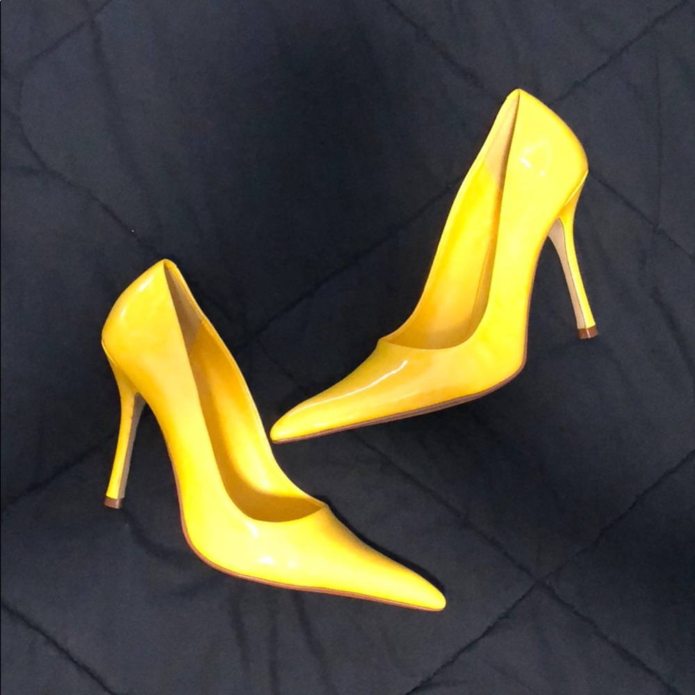 Yellow Aldo pumps